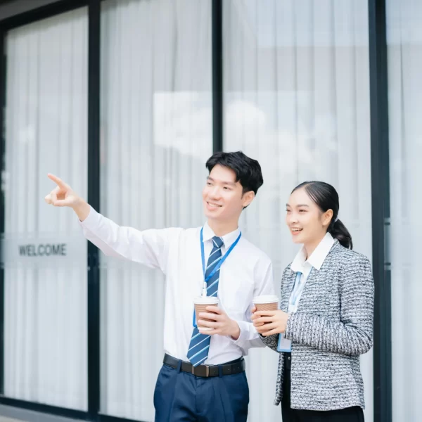 businesswoman-and-man-going-in-city-center-in-smar-2025-08-04-03-00-26-utc