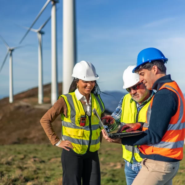 multiethnic-engineers-working-with-laptop-in-wind-2025-08-11-07-11-44-utc